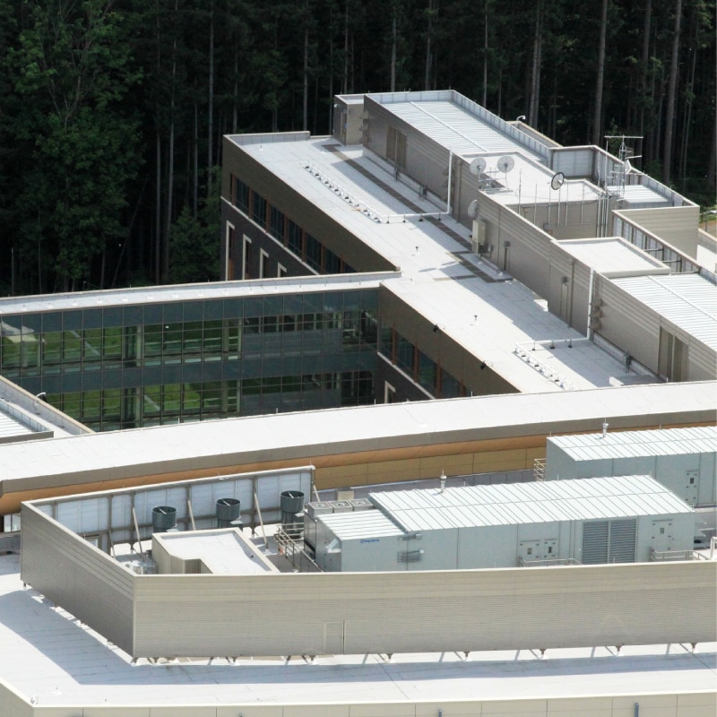 Aerial view of commercial rooftop using Siplast insulation and reflective materials