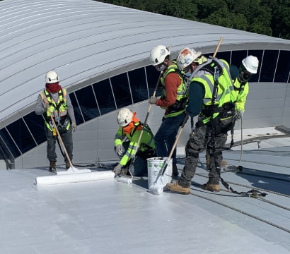 Roofing contractors installing Siplast materials