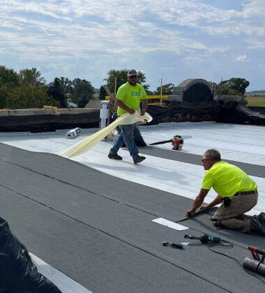 Roofing contractor installing Siplast products